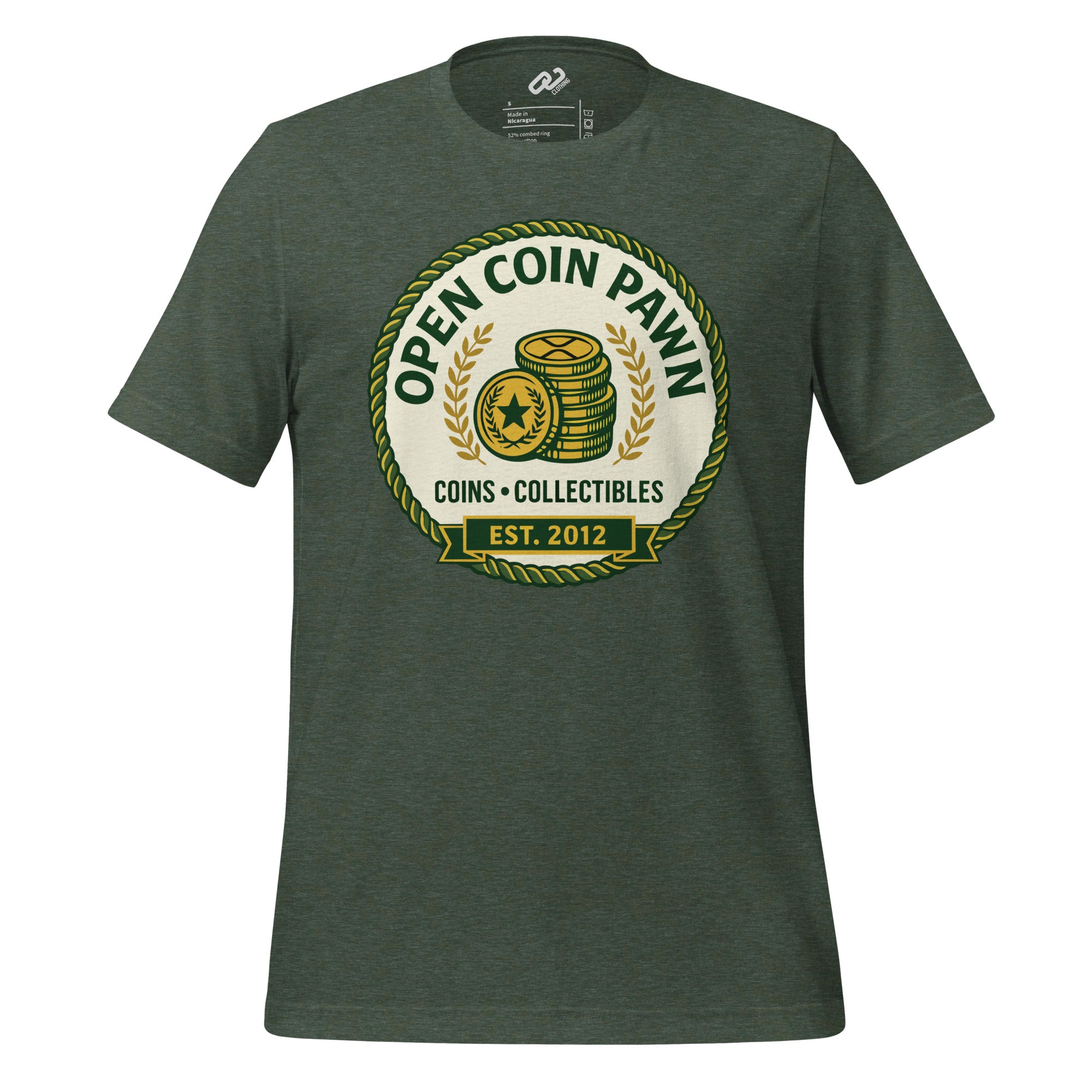 Heather green tee-shirt with a vintage circular “OPEN COIN PAWN” logo with stacked gold coins, laurel wreath, and “COINS • COLLECTIBLES EST. 2012” banner. Subtle XRP on a coin.