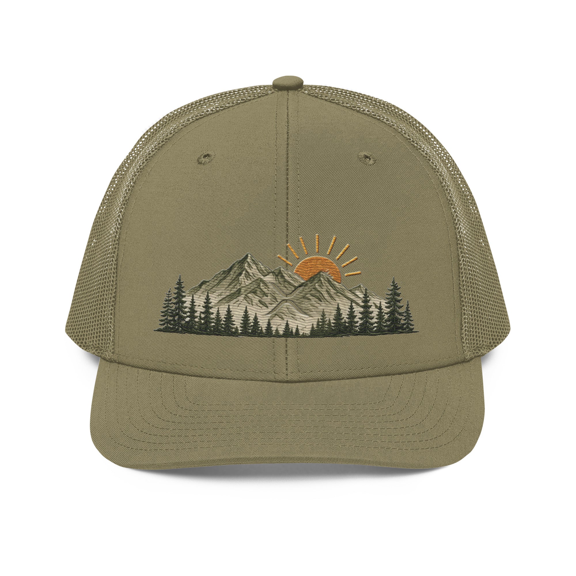 Green hat with a grey green mountain range with a yellow sun peeking out behind it and a row of evergreen trees in the foreground. An XRP logo is highlighted in the mountain range.