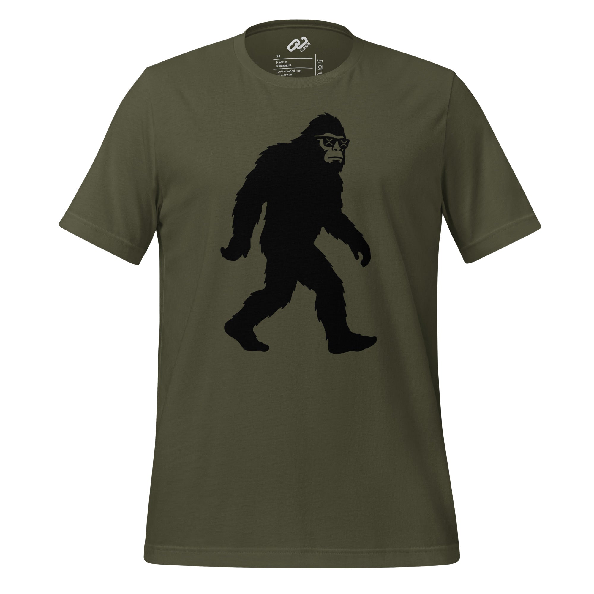 Black Yeti walking with XRP engraved sunglasses on a military green t-shirt.